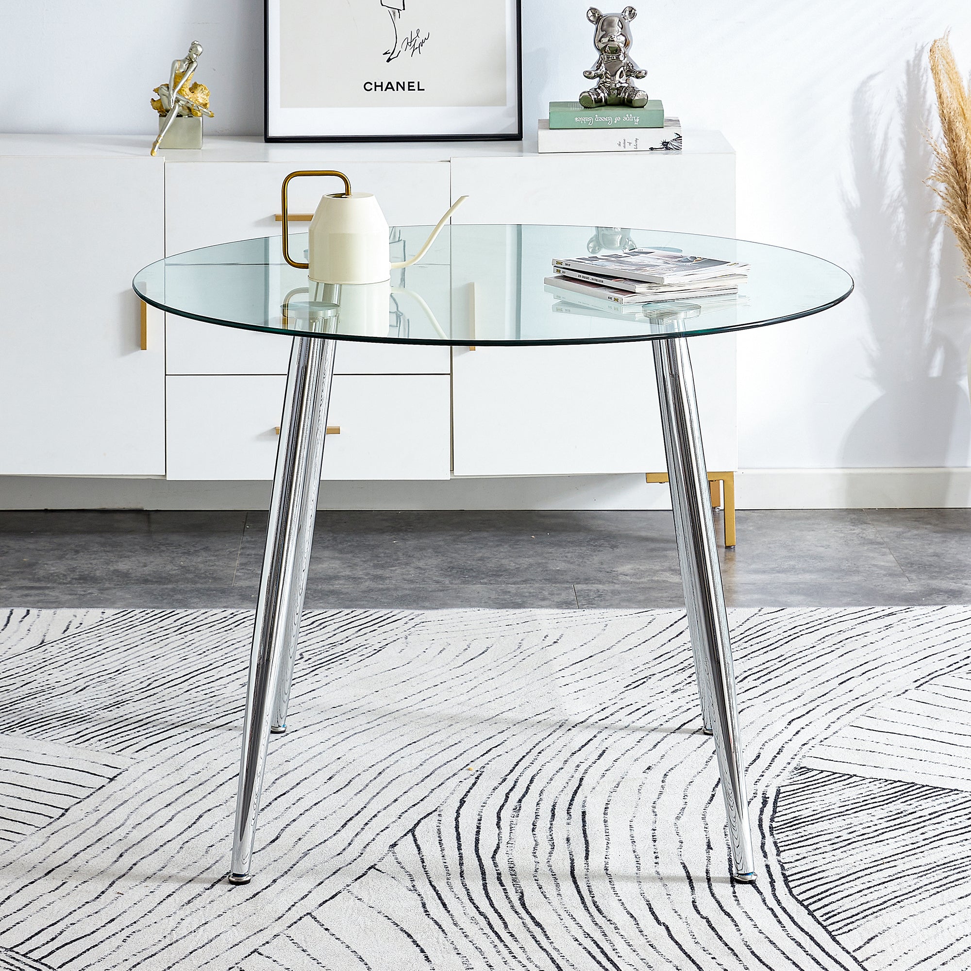 A glass tabletop with a diameter of 40 inches and a modern minimalist circular dining table with electroplated silver metal legs. Suitable for restaurants, living rooms, and conference rooms.DT-1164