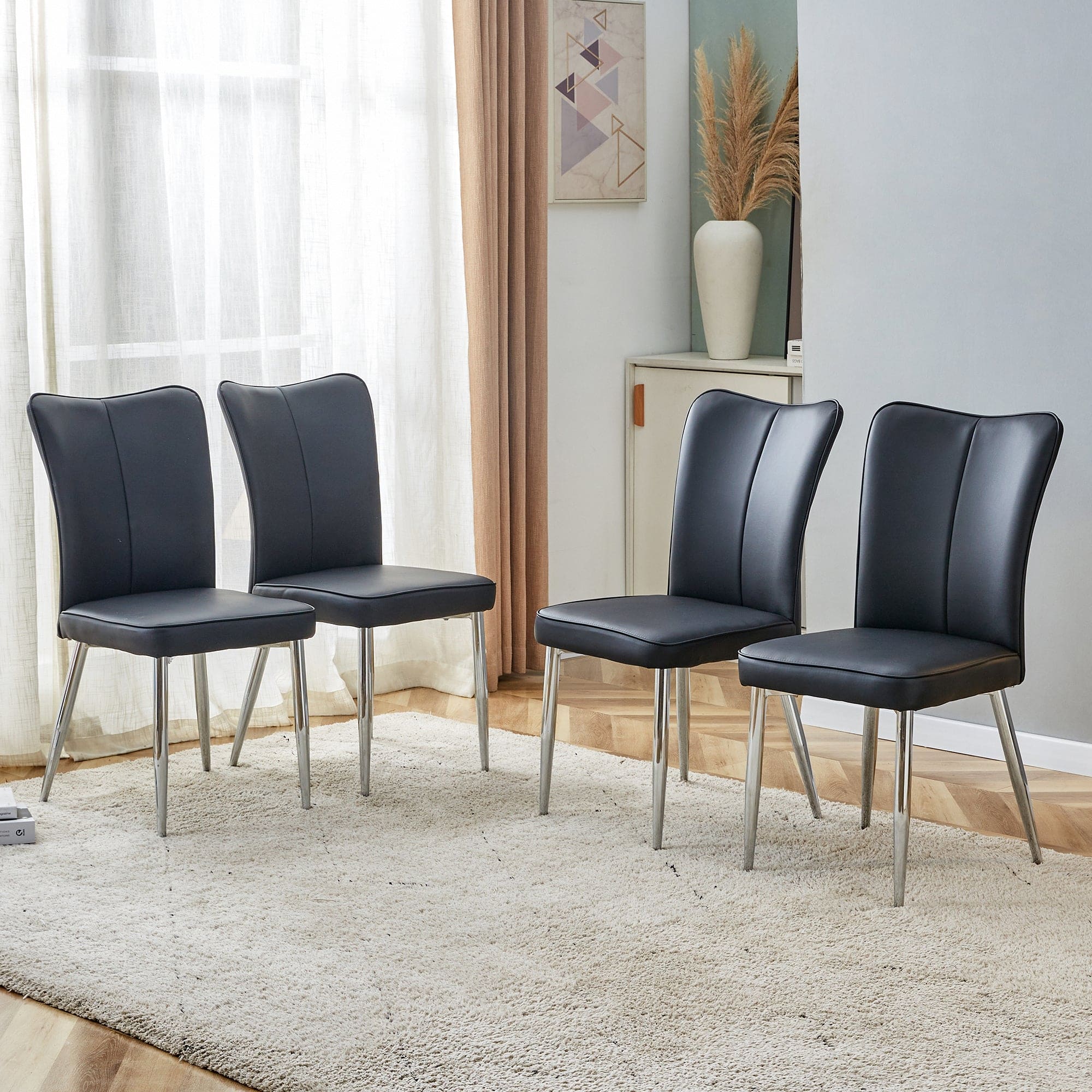 Modern minimalist dining chairs, black PU leather curved backrest and seat cushions, electroplated metal chair legs, suitable for restaurants, bedrooms, and living rooms. A set of 4 chairs.008