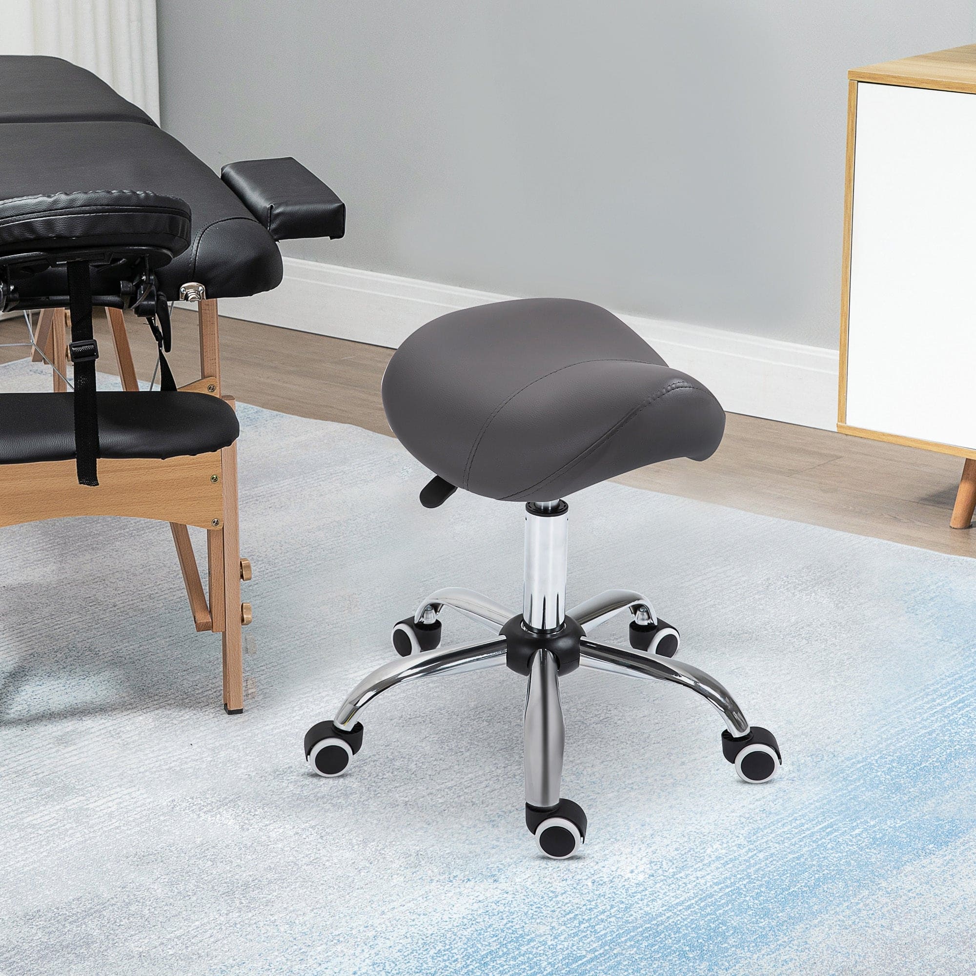 HOMCOM Ergonomic Rolling Saddle Stool PU Leather Hydraulic Spa Stool Height Adjustable Swivel Drafting Medical Salon Chair, Grey