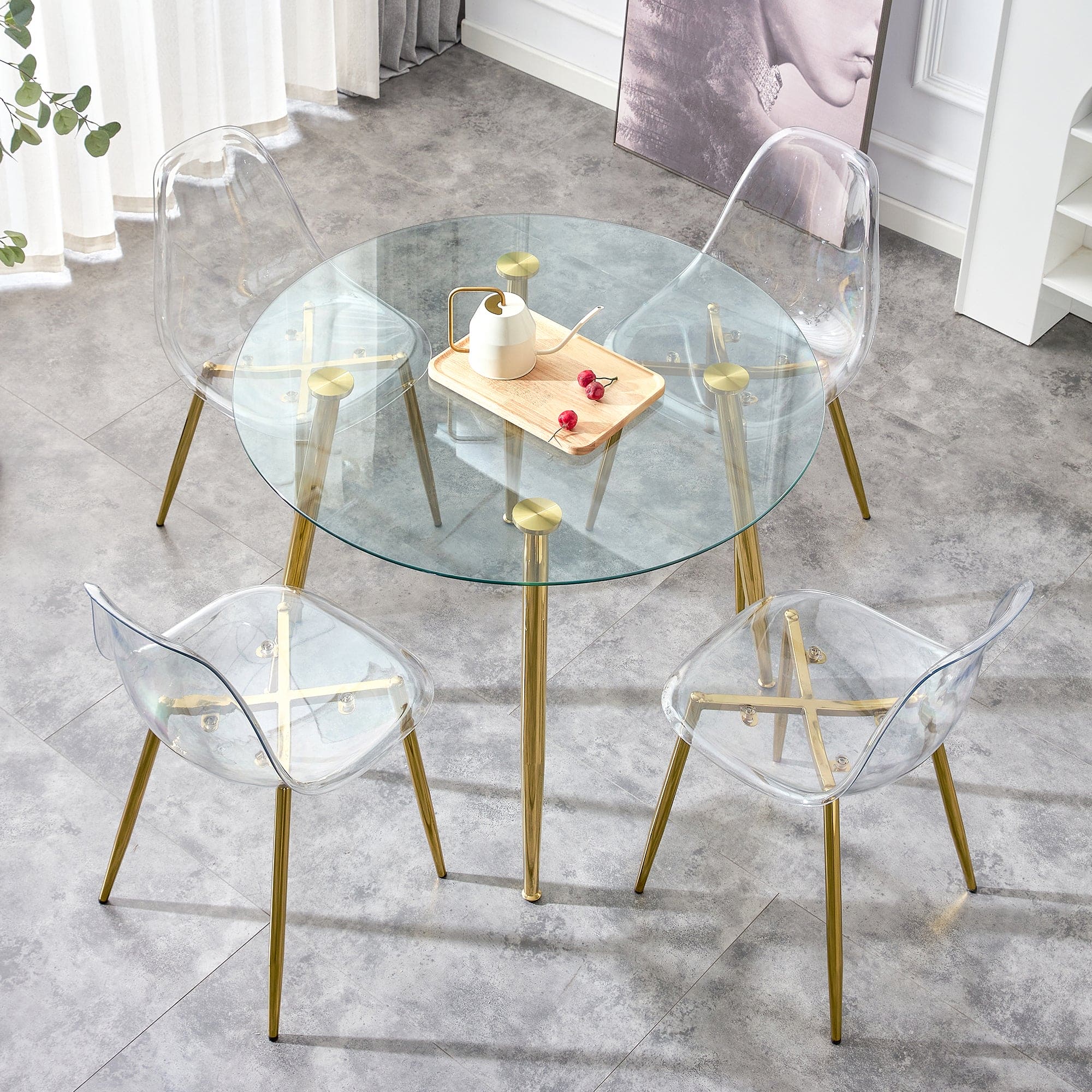 A glass tabletop with a diameter of 40 inches and a modern minimalist circular dining table with gold plated metal legs. 40 '* 40' * 30 ' DT-1164