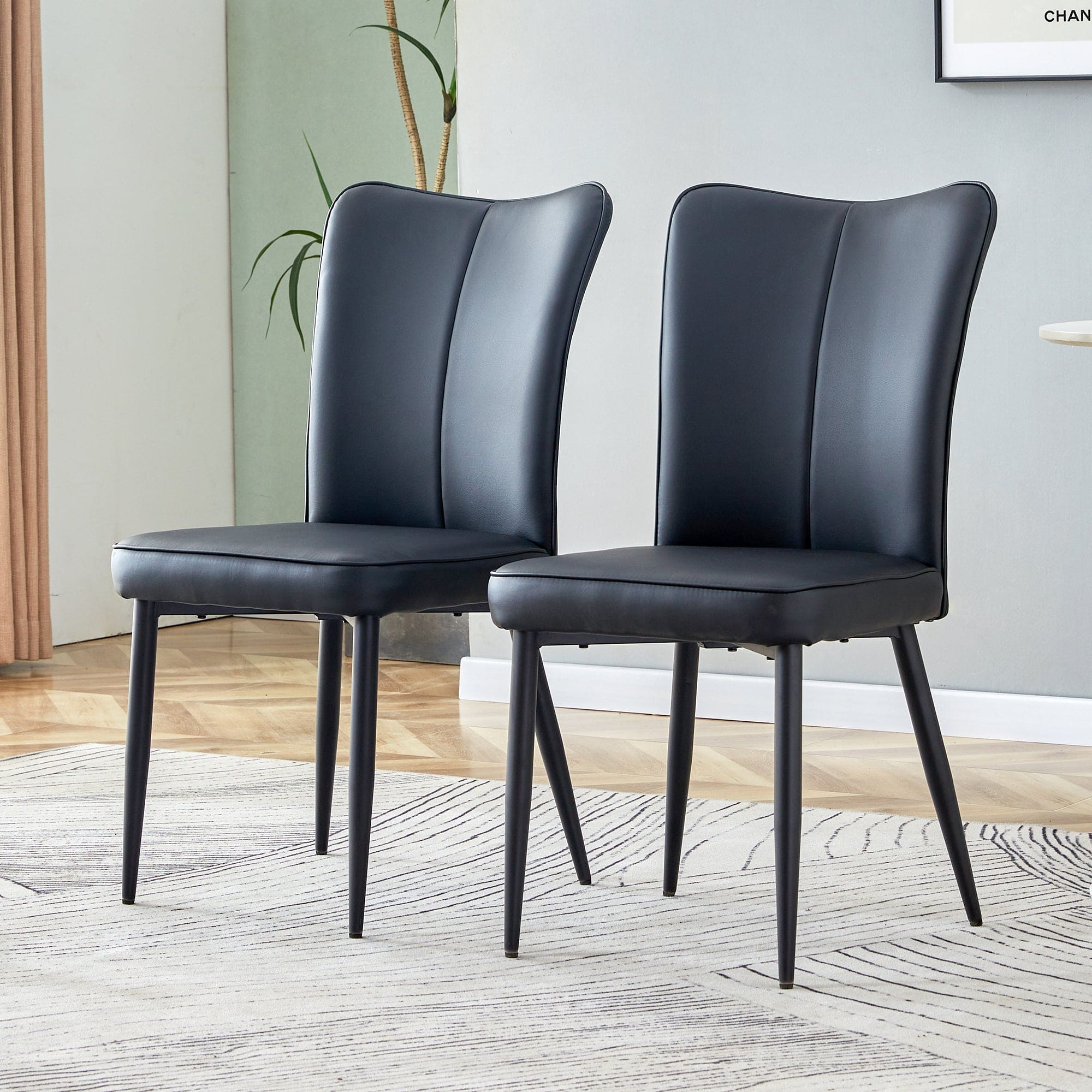 Modern minimalist dining chairs, black PU leather curved backrest and seat cushions, black metal chair legs, suitable for restaurants, bedrooms, and living rooms. A set of 2 chairs. 008