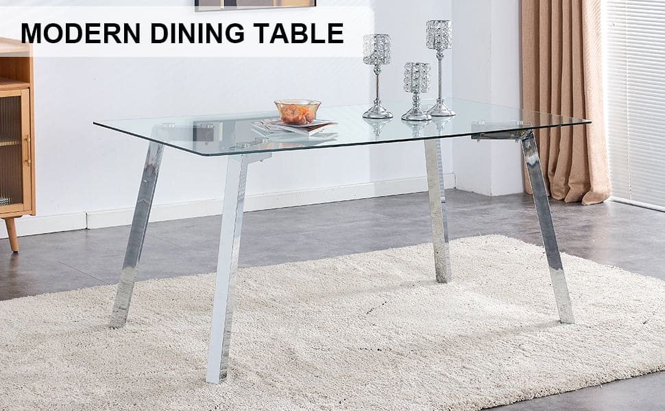 A modern minimalist rectangular glass dining table with tempered glass tabletop and silver metal legs, suitable for kitchens, restaurants, and living rooms,63"*35.4"*30"