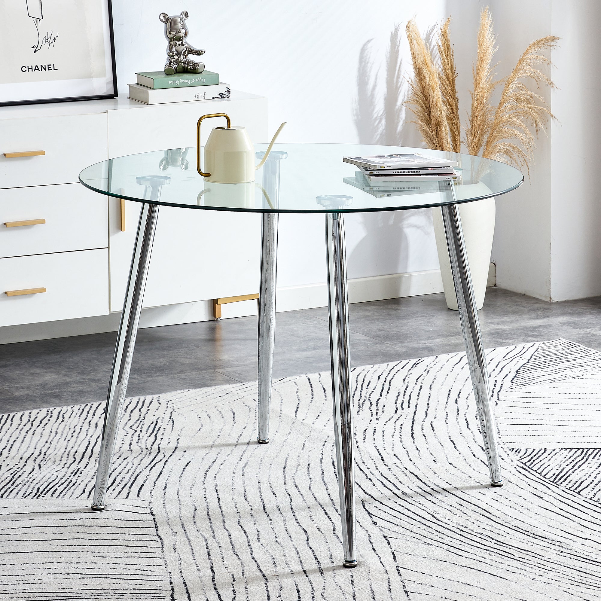 A glass tabletop with a diameter of 40 inches and a modern minimalist circular dining table with electroplated silver metal legs. Suitable for restaurants, living rooms, and conference rooms.DT-1164